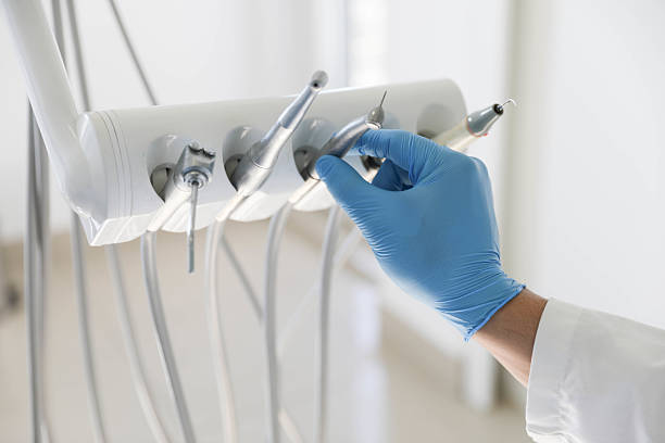 Professional Tooth Extraction technician working in Coyne Center, IL